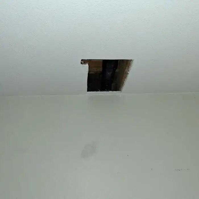Ceiling access hole with pipe