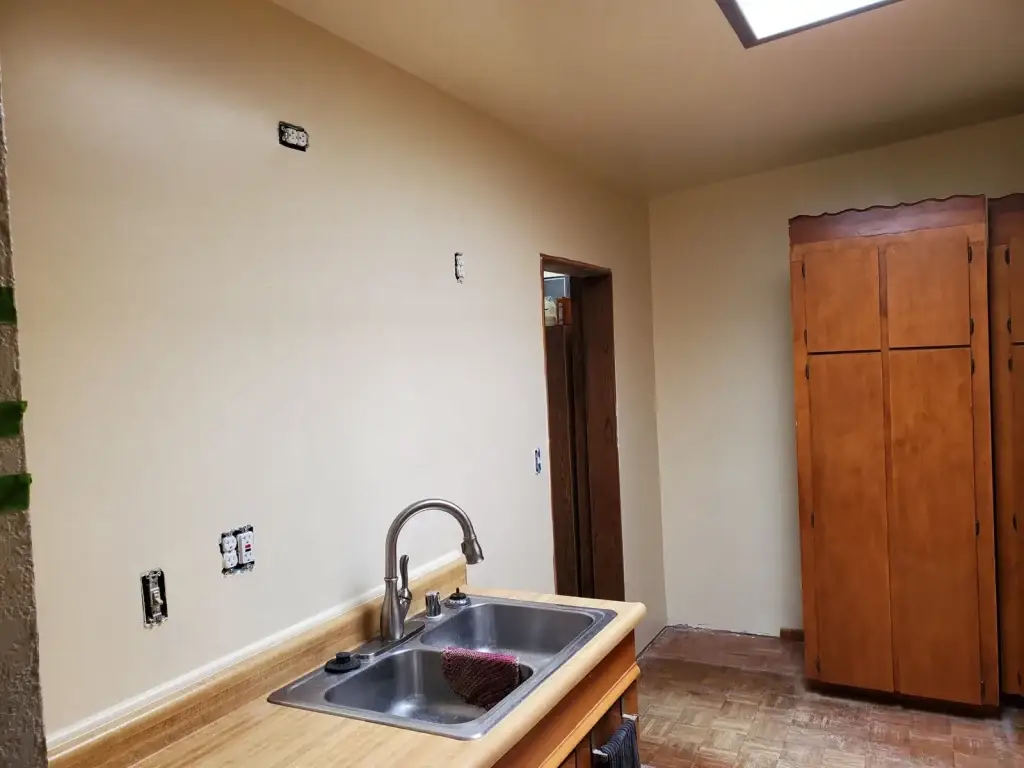 Repaired and painted kitchen wall