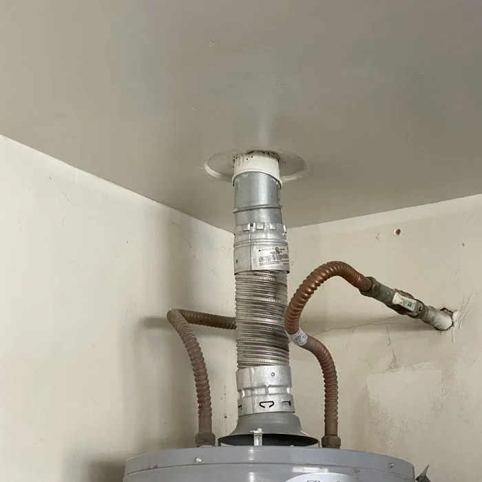 Repaired ceiling above water heater