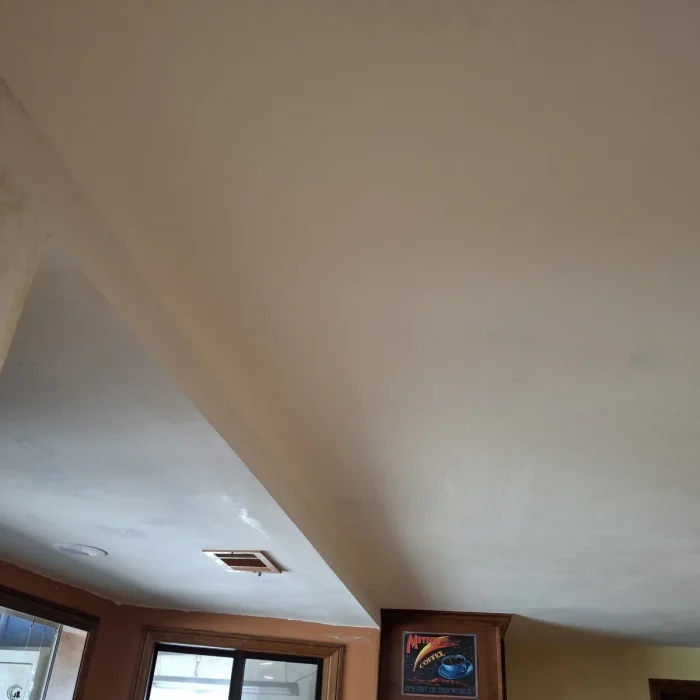 Repaired smooth ceiling over kitchen bay window