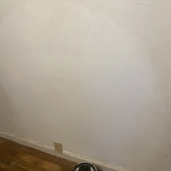 Repaired smooth plaster wall