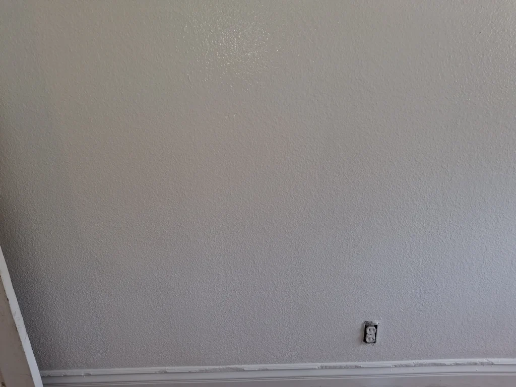 Repaired textured wall after pet damage