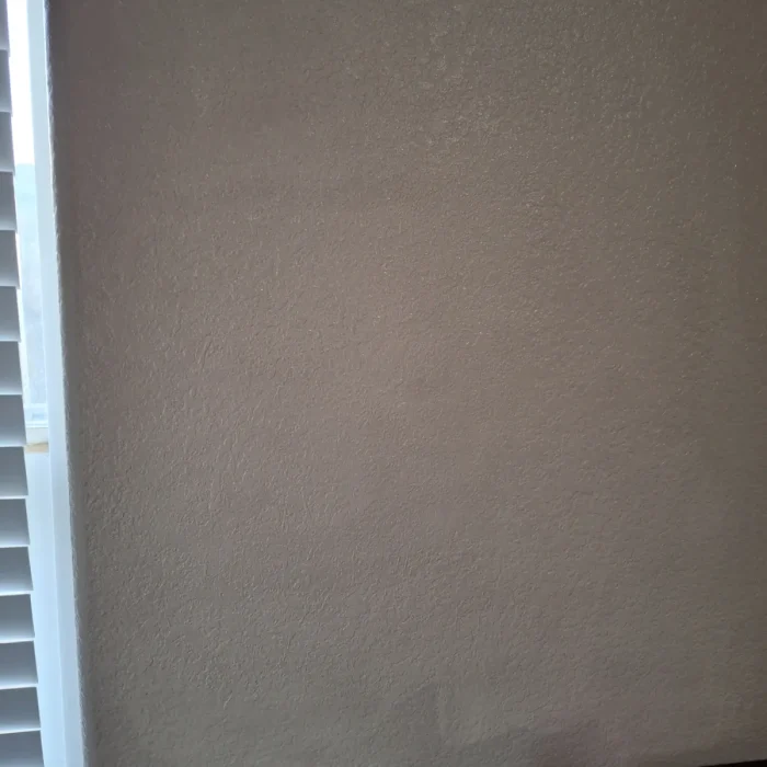 Repaired wall by window