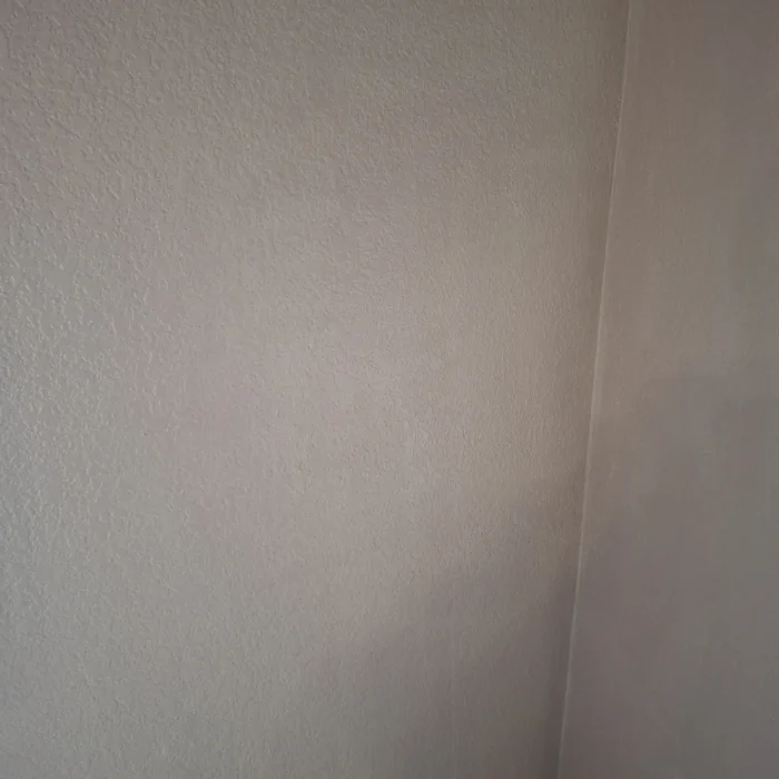 Repaired wall corner