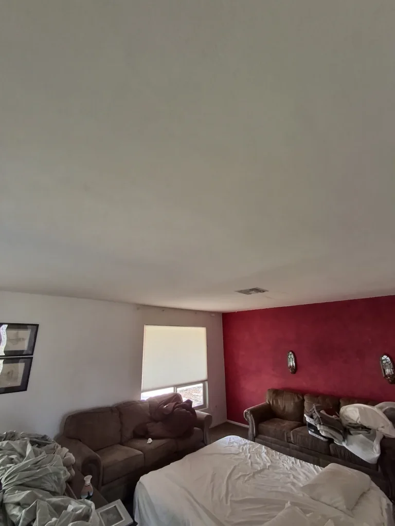 Smooth living room ceiling after popcorn removal