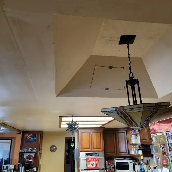 Water stained kitchen ceiling before repair